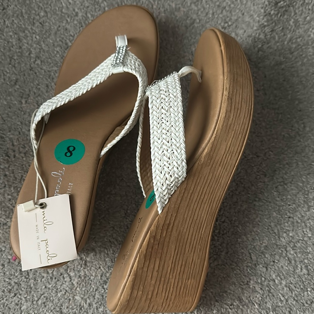 Tan woman’s sandals size 8